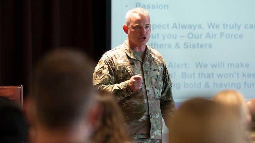 Col. Christopher Meeker, 88th Air Base Wing and installation commander, introduces himself during his first commander’s call Aug. 5 at Wright-Patterson Air Force Base. Wing leaders outlined their philosophies and expectations with military and civilian Airmen. U.S. AIR FORCE PHOTO/JAIMA FOGG