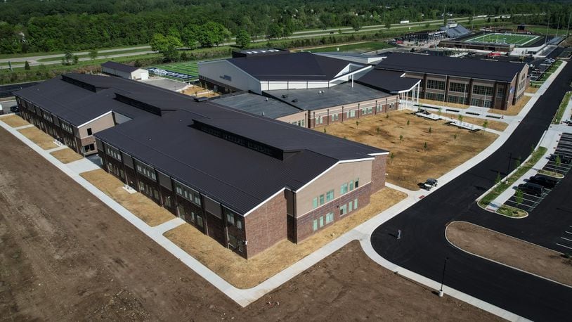 The new $95 million Fairborn High School on Commerce Center Boulevard is nearly complete. The school is set to open in August with the new school year. JIM NOELKER/STAFF