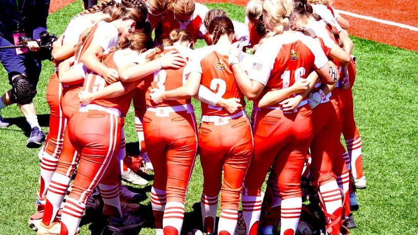 The Fairfield HIgh School softball team huddles up before taking the field vs. Austintown-Fitch in a Division I state semifinal game on Friday at Firestone Stadium in Akron. Chris Vogt/CONTRIBUTED