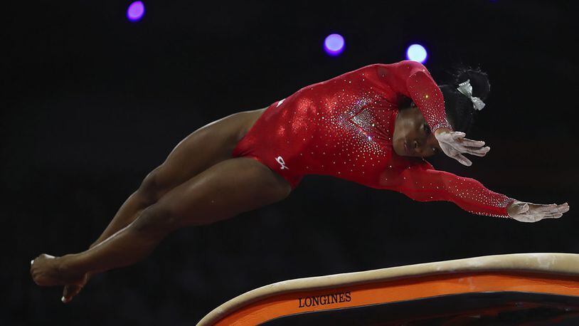 Gold medalist Simone Biles of the United States performs on the vault in the women's apparatus finals at the Gymnastics World Championships in Stuttgart, Germany, on Saturday, Oct. 12, 2019.