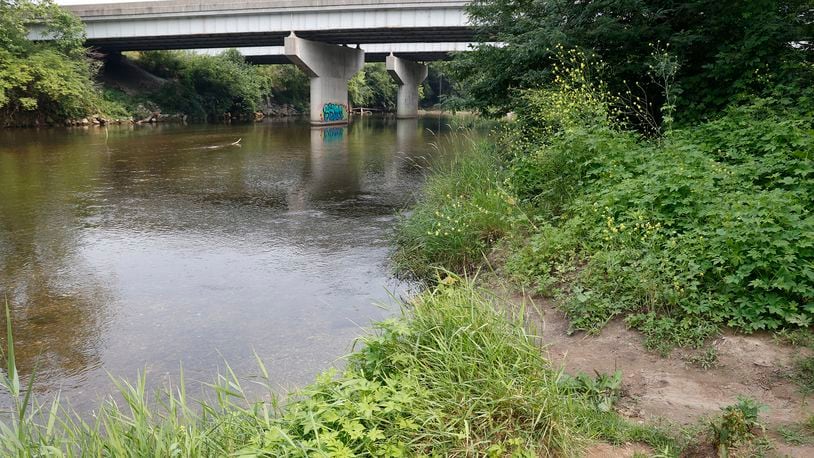 The Mad River flows under Troy Road at the end of West 1st Street in Springfield Monday, July 17, 2023. BILL LACKEY/STAFF