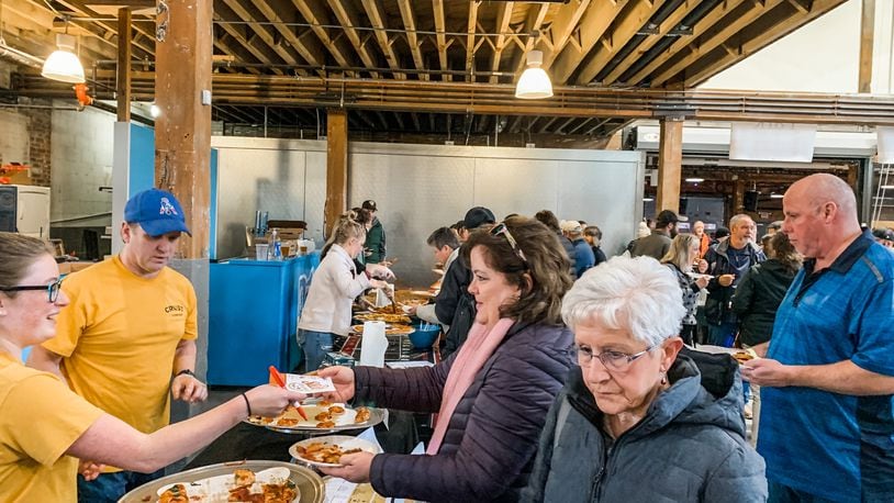 The third Slice of Springfield event gathered eight non-franchise Springfield pizza restaurants at Mother Stewart's Brewing Company, where visitors tasted samples from each and listened to live music. The event was a fundraiser for National Trail Parks and Recreation and Partners for the Parks. Contributed photo