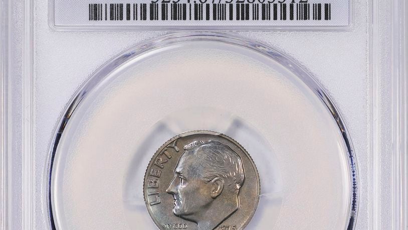 This undated image provided by GreatCollections shows a 1975 proof set dime mistakenly made without the San Francisco Mint’s letter S mintmark. (GreatCollections via AP)