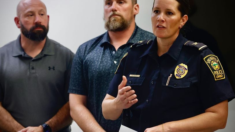 Springfield Police Chief Allison Elliott (right) speaks along with Deputy Director of Public Safety Jason Via and City Manager Bryan Heck at a press conference on a bomb threat to multiple locations across the city Thursday, Sept. 12, 2024. MARSHALL GORBY/STAFF