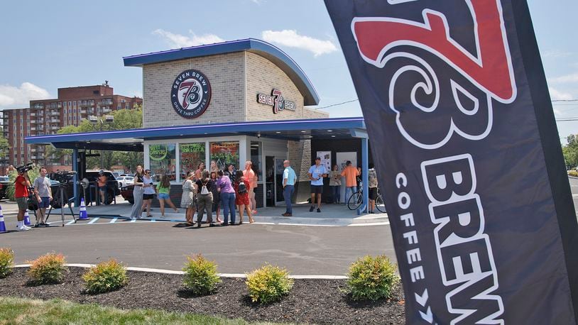 A ribbon cutting ceremony was held for the new Seven Brew location at the intersection of East Main Street and Belmont Avenue in Springfield Tuesday, July 16, 2024. The new  Seven Brew is the first in area. It offers hot and cold coffee drinks as well as energy drinks, milk shakes and smoothies. BILL LACKEY/STAFF