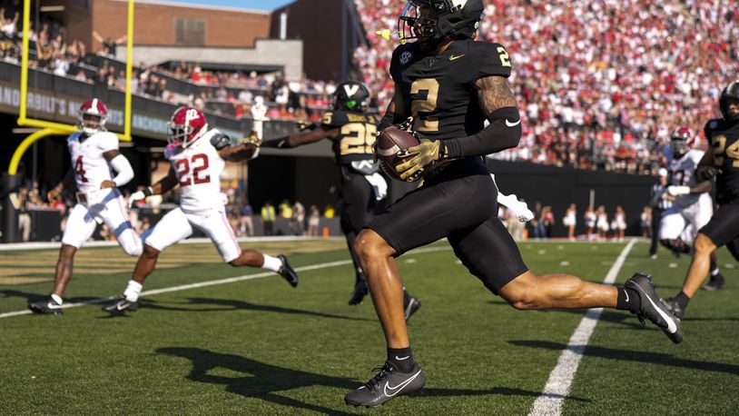 Vanderbilt linebacker Randon Fontenette (2) returns an interception for a touchdown during the first half of an NCAA college football game against Alabama, Saturday, Oct. 5, 2024, in Nashville, Tenn. (AP Photo/George Walker IV)