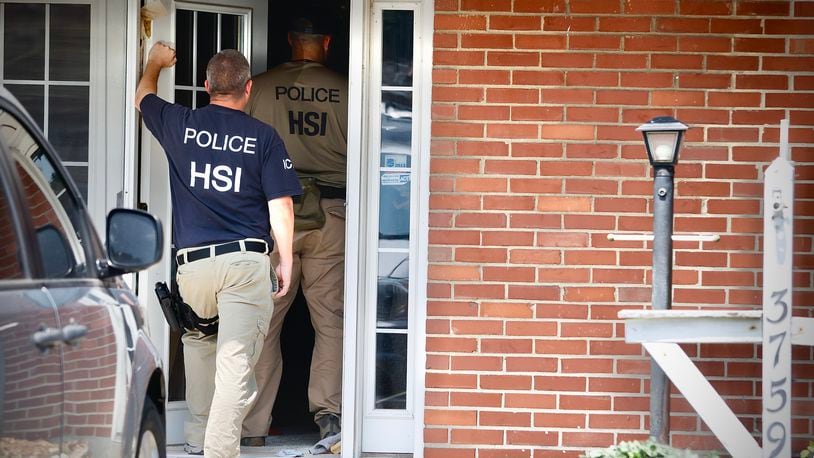 Homeland Security Investigations agents were outside a residence in the 3700 block of Waterbury Drive in Kettering as part of a federal investigation into allegations of financial crimes and labor exploitation. Search warrants were served at Fuyao Glass America and 27 other locations in the region on Friday, July 26, 2024, as part of the investigation. JIM NOELKER / STAFF