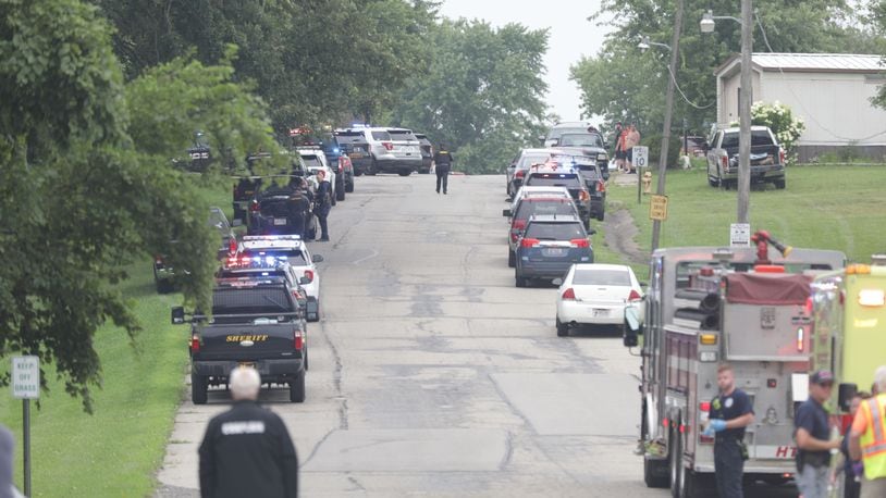 Several Clark County sheriff’s deputies and other local law enforcement agencies rushed to an area near South Vienna in Harmony Twp. after of a reported officer-involved shooting. MARSHALL GORBY/STAFF
