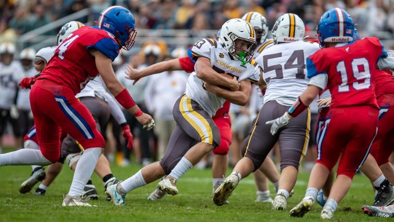 Kenton Ridge High School's Jackson Patton carries the ball during their game at Northwestern last season. CONTRIBUTED PHOTO BY MICHAEL COOPER