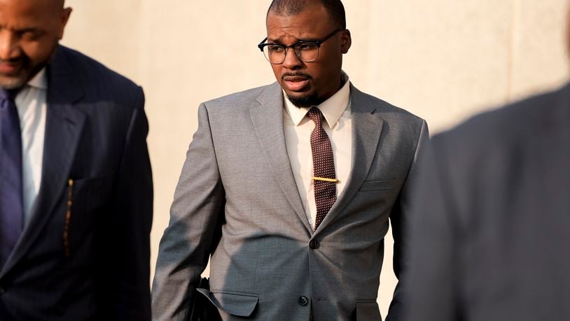 Former Memphis police officer Justin Smith leaves the federal courthouse after the first day of jury selection of the trial in the Tyre Nichols case Monday, Sept. 9, 2024, in Memphis, Tenn. (AP Photo/George Walker IV)