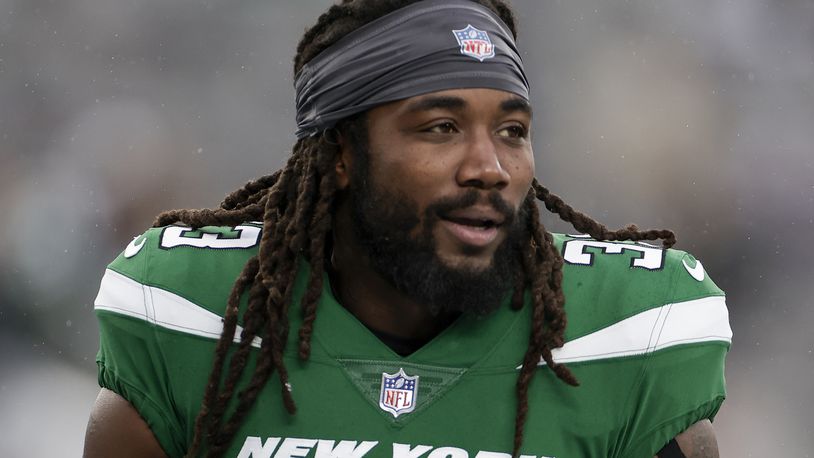 FILE - New York Jets running back Dalvin Cook (33) warms up before playing against the Atlanta Falcons in an NFL football game, Sunday, Dec. 3, 2023, in East Rutherford, N.J. (AP Photo/Adam Hunger, File)