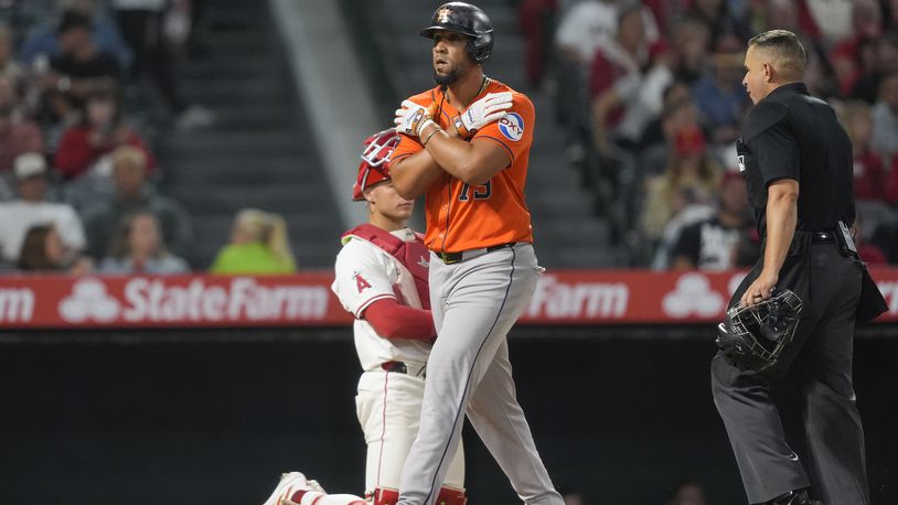 Houston Astros' Jose Abreu celebrates his solo home run during the eighth inning of a baseball game against the Los Angeles Angels, Friday, June 7, 2024, in Anaheim, Calif. (AP Photo/Ryan Sun)