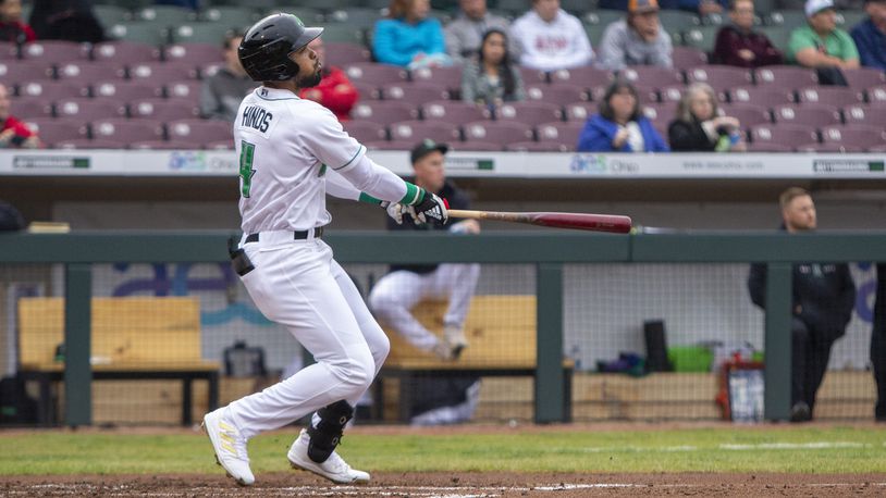 Dragons right fielder Rece Hinds watches his third home run of the season, a solo shot, clear the wall in right-center field in the second inning during the first game of Wednesday night's doubleheader. Jeff Gilbert/CONTRIBUTED