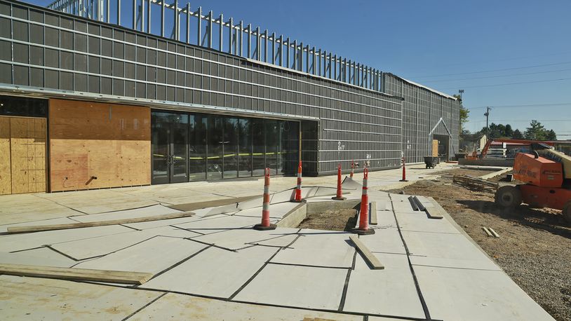 Members of the Global Impact STEM Academy Board of Directors took a tour of the school's new Upper Academy under construction on the Clark State College Leffel Lane campus Tuesday, Oct. 8, 2024. BILL LACKEY/STAFF