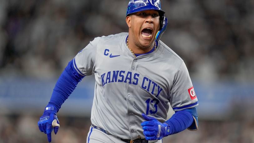 Kansas City Royals' Salvador Perez (13) reacts after hitting a solo home run against the New York Yankees during the fourth inning of Game 2 of the American League baseball playoff series, Monday, Oct. 7, 2024, in New York. (AP Photo/Seth Wenig)