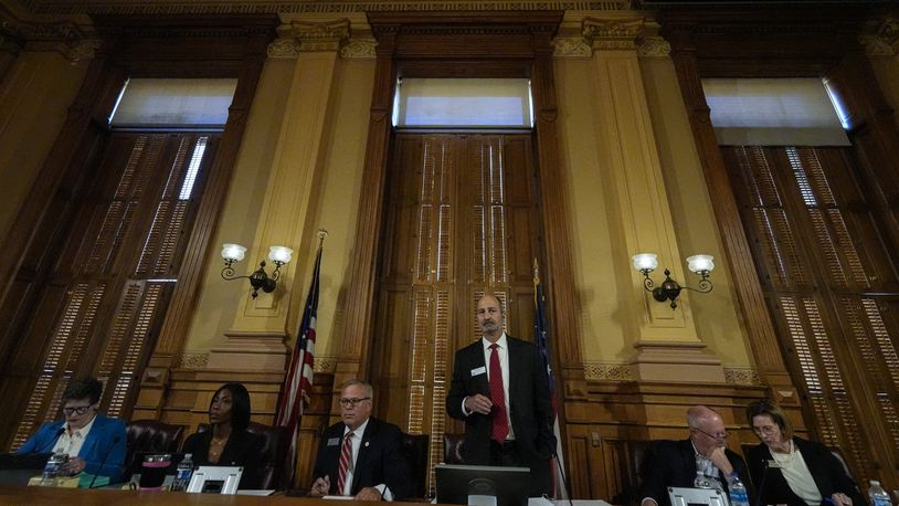 Georgia's State Election Board members discuss proposals for election rule changes at the state capitol, Friday, Sept. 20, 2024, in Atlanta. (AP Photo/Mike Stewart)