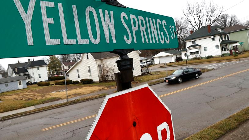 A car drives along Yellow Springs Street in Springfield Thursday, Feb. 16, 2023. Springfield City Commission this week authorized major spending for the streets program started in 2018 by approving a $3.5 million project involving the reconstruction of Yellow Springs Street. BILL LACKEY/STAFF