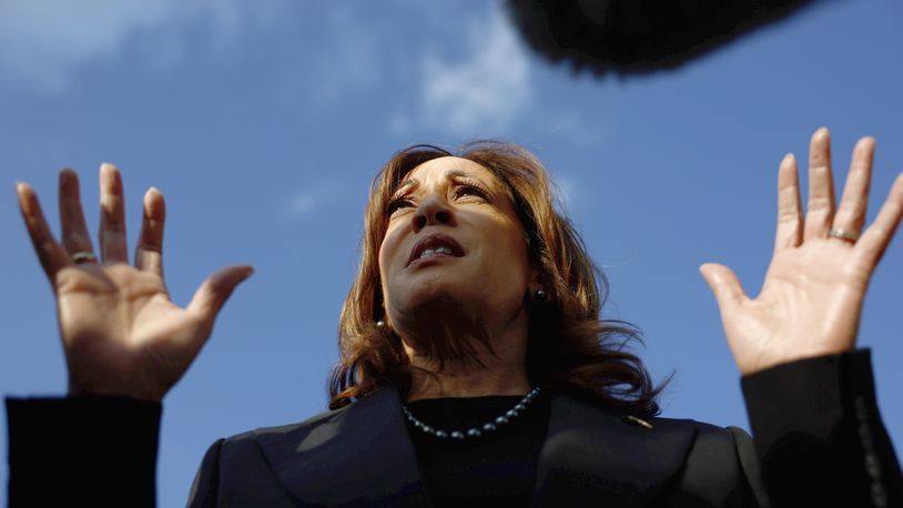 Democratic presidential nominee Vice President Kamala Harris speaks to reporters before boarding Air Force Two to depart for New York at Joint Base Andrews, Md., Monday, Oct. 7, 2024. (Evelyn Hockstein/Pool via AP)