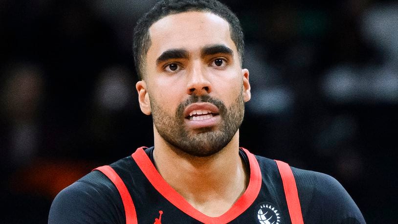 FILE - Toronto Raptors forward Jontay Porter lookson during the first half of the team's NBA basketball game against the Chicago Bulls, Jan. 18, 2024, in Toronto. Court papers indicate that former Toronto Raptors player Jontay Porter will be charged with a federal felony connected to the sports betting scandal that spurred the NBA to ban him for life. (Christopher Katsarov/The Canadian Press via AP, File)