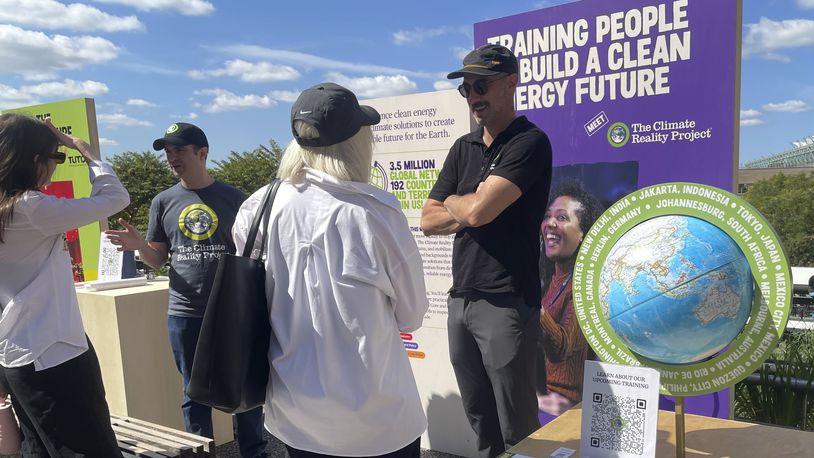 People look at exhibits at the Climate Science Fair, an outdoor exhibit hosted by the Emerson Collective during the annual Climate Week NYC and United Nations General Assembly on Sunday, Sept. 22, 2024, in New York. (AP Photo/Thalia Beaty)