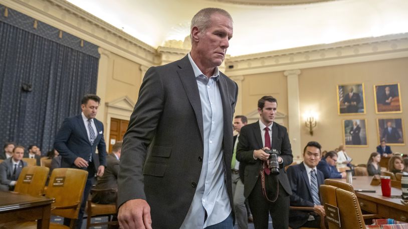 Former NFL quarterback Brett Favre arrives to appear before the House Committee on Ways and Means on Capitol Hill, Tuesday, Sept. 24, 2024, in Washington. (AP Photo/Mark Schiefelbein)