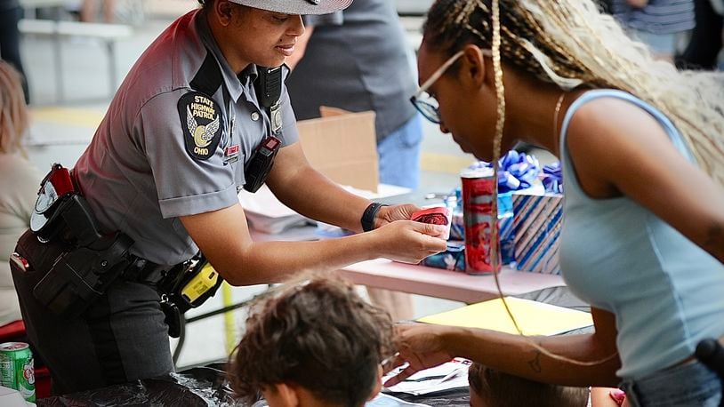 Several events will be held this weekend in Clark and Champaign Counties, including New Carlisle’s Christmas in July on Saturday on Main St. FILE/MARSHALL GORBY/STAFF