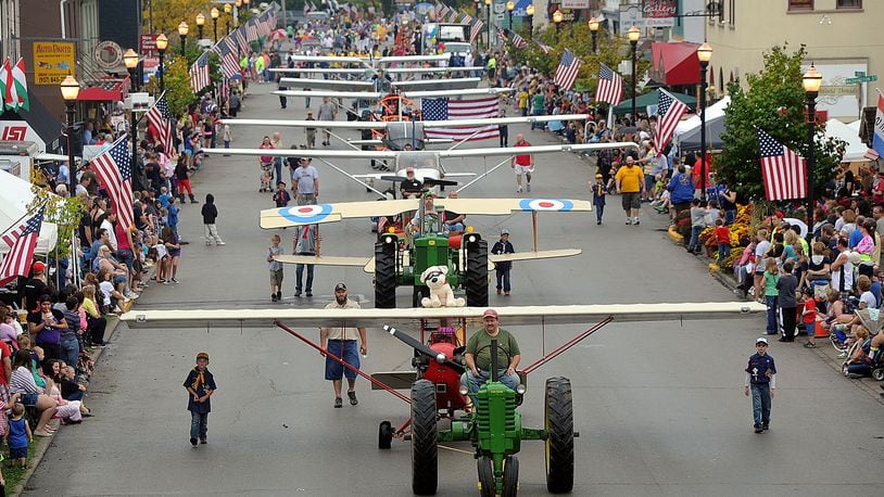 The parade of planes at the New Carlisle Heritage of Flight Festival. MARSHALL GORBY / STAFF