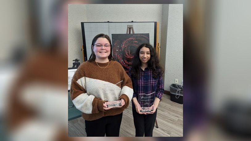Greenon Local School District eighth grader Violet Breland (right) and senior Kaity Fields (left) placed first and second in the Congressional Art Show. Contributed