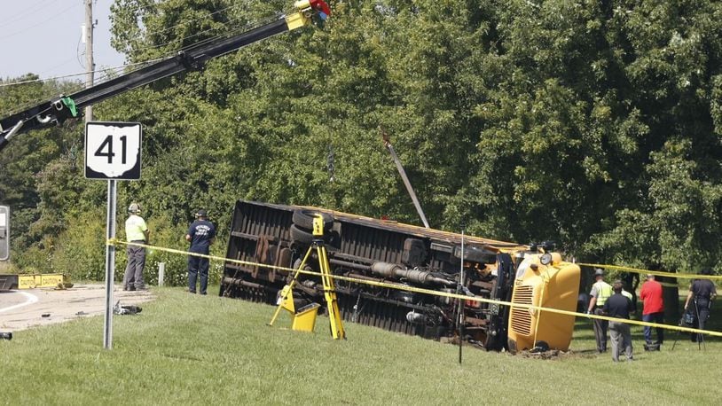 At least one person was killed after a Northwestern school bus was involved in a crash on Route 41 in German Twp. Tuesday, Aug. 22, 2023. BILL LACKEY/STAFF