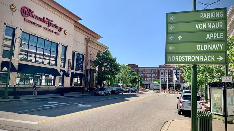 Signage points shoppers to some of the 100-plus stores and restaurants at The Greene Town Center in Beavercreek on Tuesday, May 16, 2024. MARSHALL GORBY / STAFF