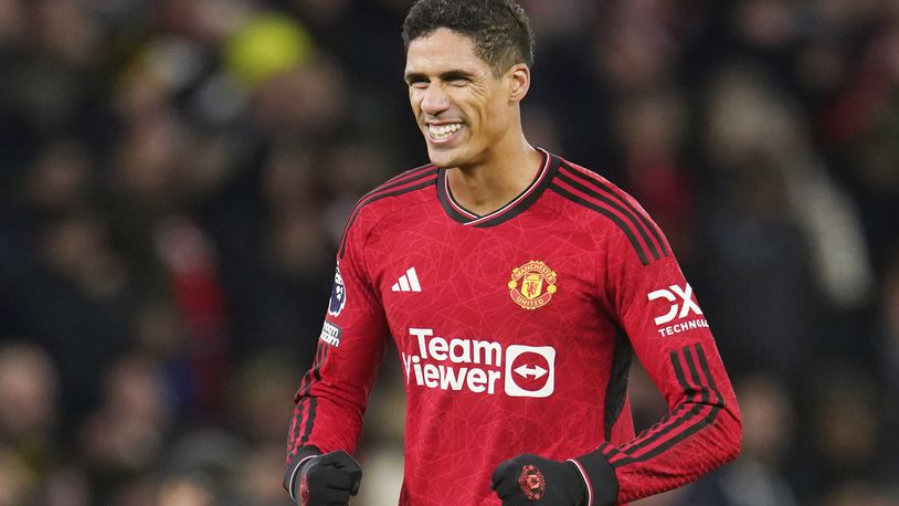 FILE - Manchester United's Raphael Varane celebrates on the full time during the English Premier League soccer match between Manchester United and Aston Villa at the Old Trafford stadium in Manchester, England, on Dec. 26, 2023. (AP Photo/Dave Thompson, File)