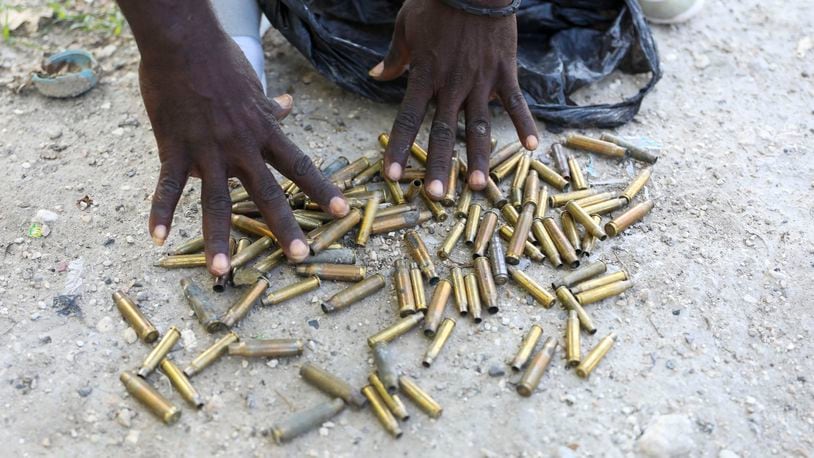 Local Frantz Baptist shows bullet casings he collected from the streets near his home days after an armed gang attack on Pont-Sonde, Haiti, Tuesday, Oct. 8, 2024. (AP Photo/Odelyn Joseph)