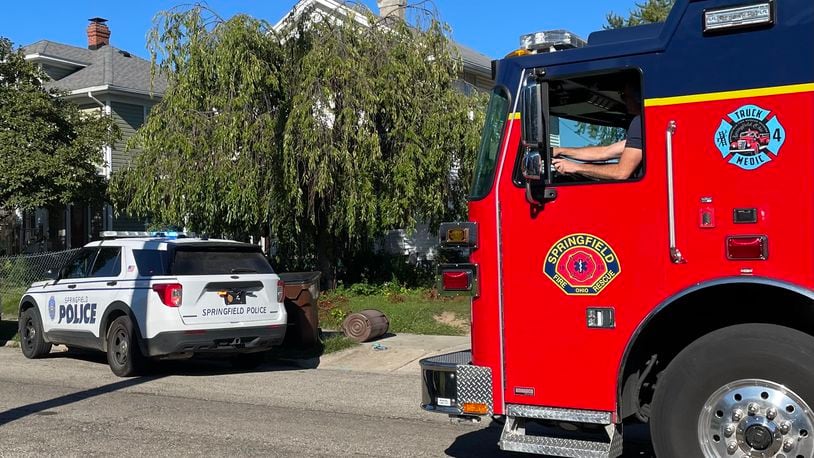 Springfield police and fire personnel were on the scene at a house in the 200 block of North Clairmont Avenue where a 2-year-old boy was found in a backyard pool Thursday, Aug. 31, 2023. BILL LACKEY/STAFF