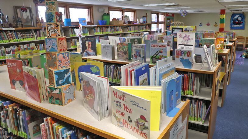 The Childrens section at the New Carlisle Library. BILL LACKEY/STAFF