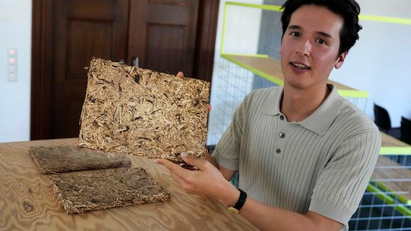 HopfON entrepreneur, Mauricio Fleischer Acuna poses in Munich, Germany, Friday, Sept. 20, 2024. The startup is using the organic waste, some from the hops harvest, to make sustainable building materials like acoustic panels and thermal insulation, with the twofold goal of reducing waste from the construction industry. (AP Photo/Matthias Schrader)