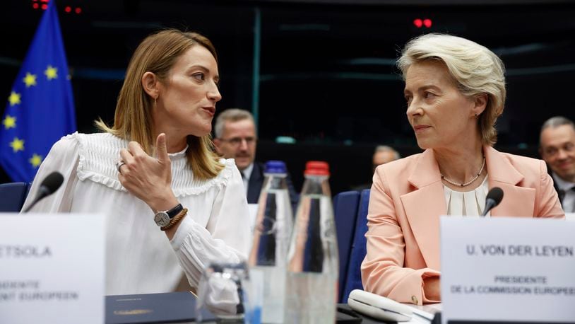 European Parliament President Roberta Metsola, left, and European Commission President Ursula von der Leyen, right, talk prior to the start of a session at the European Parliament, Tuesday, Sept. 17, 2024 in Strasbourg. (AP Photo/Jean-Francois Badias)