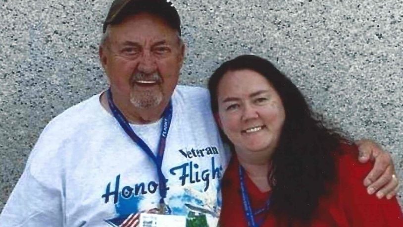 Bernie Coppock and his daughter Kelly in front of the Ohio Pillar at the World War II Memorial during an Honor Flight tour to Washington, D.C. CONTRIBUTED