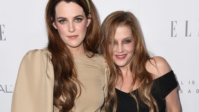 FILE - Riley Keough, left, and her mother Lisa Marie Presley arrive at the 24th annual ELLE Women in Hollywood Awards on Oct. 16, 2017, in Los Angeles. (Photo by Jordan Strauss/Invision/AP, File)