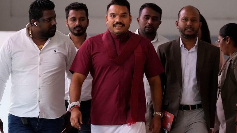 FILE - Presidential candidate Namal Rajapaksa arrives for a meeting along with his supporters in Colombo, Sri Lanka, Thursday, Sept. 5, 2024. (AP Photo/Eranga Jayawardena, File)