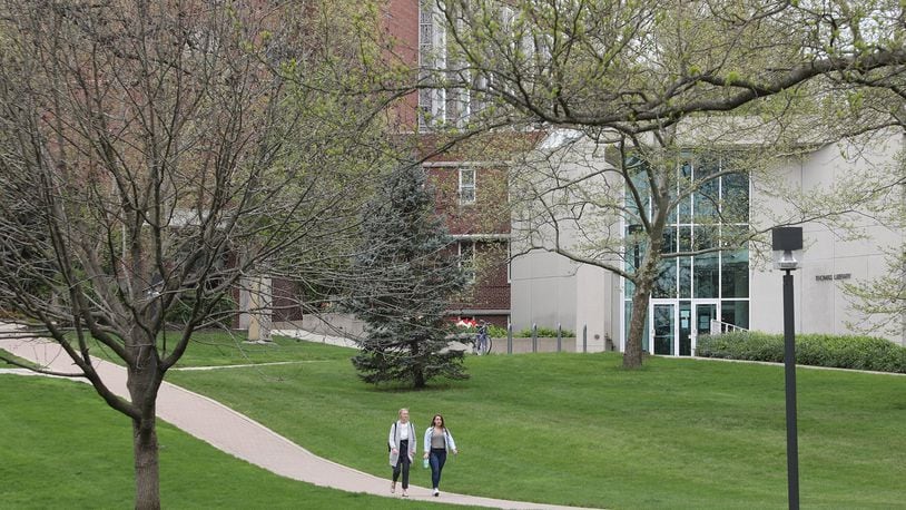 Wittenberg University students walk across campus. BILL LACKEY/STAFF