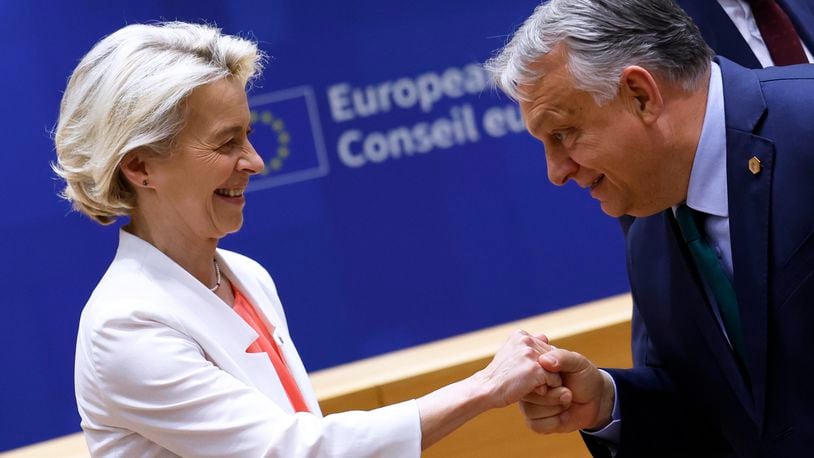 European Commission President Ursula von der Leyen, left, is greeted by Hungary's Prime Minister Viktor Orban during a round table meeting at an EU summit in Brussels, Monday, June 17, 2024. The 27 leaders of the European Union gather in Brussels on Monday evening to take stock of recent European election results and begin the fraught process of dividing up the bloc's top jobs, but they will be playing their usual political game with a deck of reshuffled cards. (AP Photo/Geert Vanden Wijngaert)