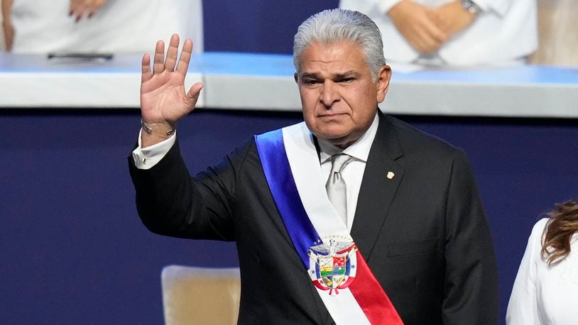 New Panamanian President Jose Raul Mulino waves before giving a speech at his swearing-in ceremony at the Atlapa Convention Centre in Panama City, Monday, July 1, 2024. (AP Photo/Matias Delacroix)