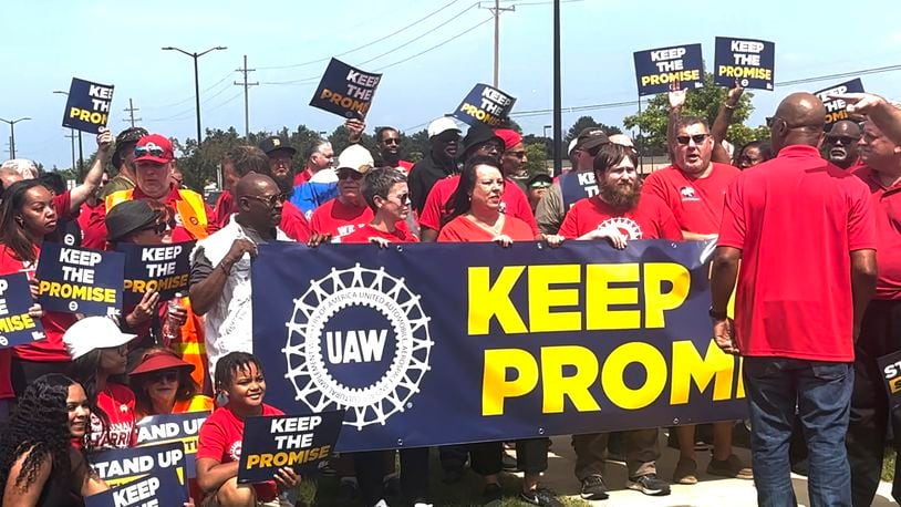 In this image from video, United Auto Workers members rally outside Stellantis' Sterling Heights Assembly Plant Friday, Aug. 23, 2024, in Sterling Heights, Mich. (AP Photo/Tom Krisher)