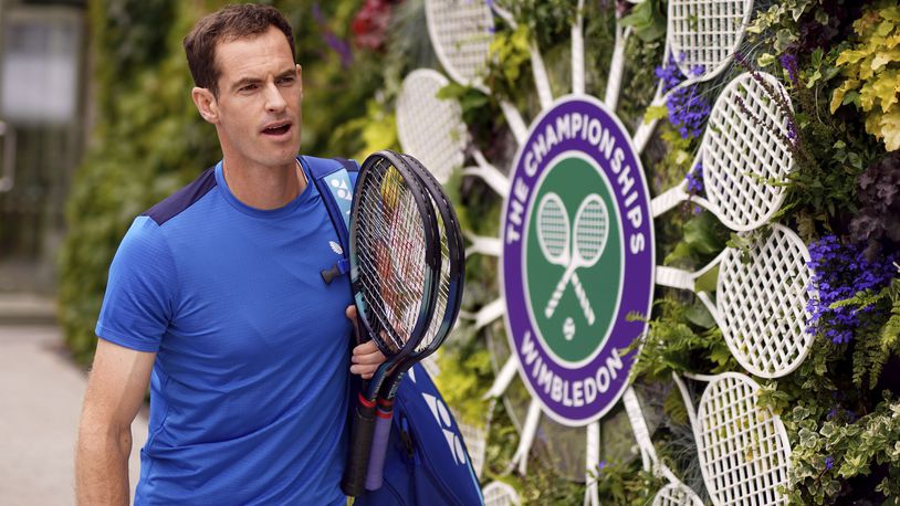 Britain's Andy Murray arrives at the practice court on day two of the Wimbledon tennis championships, in London, Tuesday, July 2, 2024. Murray will play only doubles at his last appearance at the All England Club following his withdrawal from singles after back surgery. (Jordan Pettitt/PA via AP)