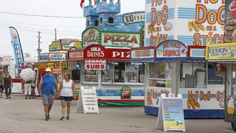 The midway at the Clark County Fair offers a variety of sweet and savory food choices. BILL LACKEY/STAFF