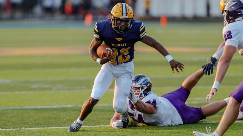 Springfield's Tre Montgomery looks for room to run against Gonzaga College High school from Washington, D.C., in Springfield on Aug. 30, 2024. The Wildcats lost 14-6. Michael Cooper/CONTRIBUTED