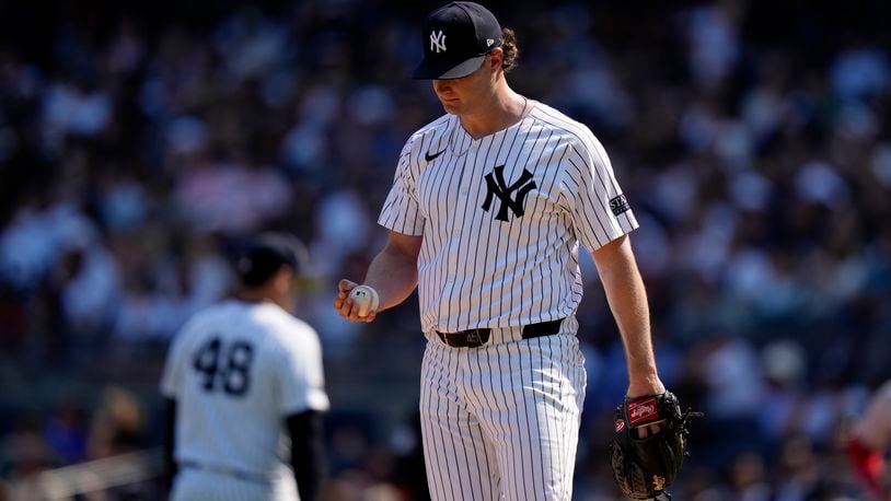 New York Yankees pitcher Gerrit Cole reacts after Boston Red Sox's Rafael Devers hit a two-run single during the fifth inning of a baseball game, Saturday, Sept. 14, 2024, in New York. (AP Photo/Frank Franklin II)