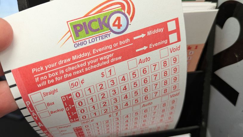 The Ohio Lottery Pick 4 game card in local store in the Dayton area. SAM WILDOW\STAFF