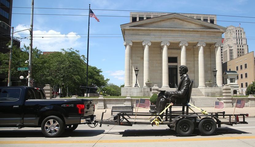 PHOTOS: 1,700 pound Abraham Lincoln catches a ride from Urbana to Dayton