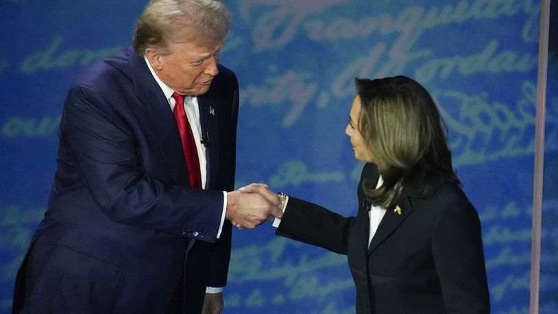 FILE - Republican presidential nominee former President Donald Trump and Democratic presidential nominee Vice President Kamala Harris shake hands before the start of an ABC News presidential debate at the National Constitution Center, Sept. 10, 2024, in Philadelphia. (AP Photo/Alex Brandon, file)